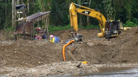 Small scale gold mining on the bank of an Amazonian river Stock Footage 88306565
