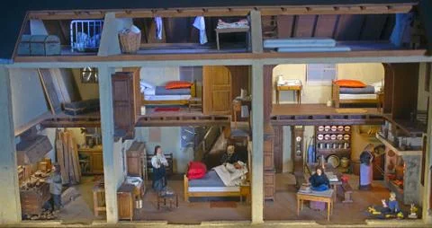 Small scale model representing house life in 19th century Stock Photos