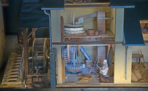 Small scale representation of a work in an old mill Stock Photos