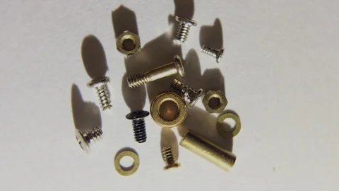 Small screw And Nut  macro shot Rotating Turning Stock Footage 126079647