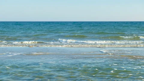 Small sea spit against which waves beat. Stock Footage 170371911
