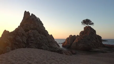 The small sea in Tossa de Mar at sunrise Stock Footage 111584026