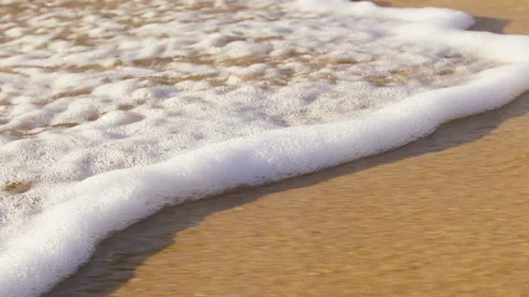 Small sea wave, Soft wave on sand beach for opening video, text space background Stock Footage 197007410