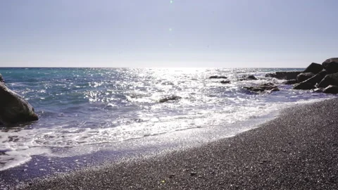 Small sea waves overlook a beautiful beach Stock Footage 171323766