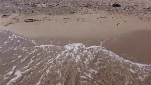 Small sea waves washing sandy shore, calm seaside Stock Footage 327830795