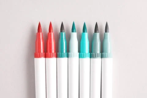 Small set of opened felt-tip pens, turquoise pink colors Stock Photos