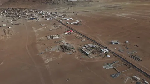 Small Settlement in Arid Mountain Valley in Tibetan Highland Desert Stock Footage 316980401