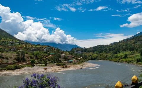 Small settlement by the river side in Bhutan Stock Photos