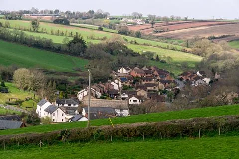 A small settlement on the slopes and meadows of Devon, England, Europe. Stock Photos