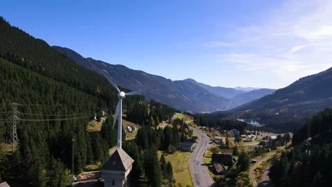 A small settlement in a valley between the mountains. Stock Footage 141994170