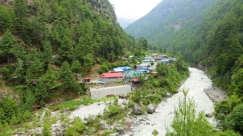 Small settlements of Nepal with a rocky path on the side Stock Footage 77446008