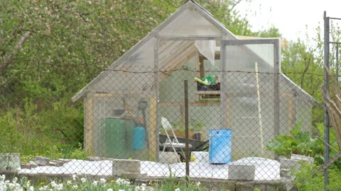 A small sheltered house on the yard Stock Footage 137363271