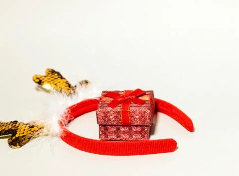 Small Shining Red Gift Box with Deer Golden  Horns, New Year concept Stock Photos