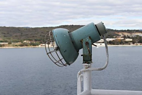 Small ship floodlight designed to illuminate the deck is mounted on the side  Foto stock