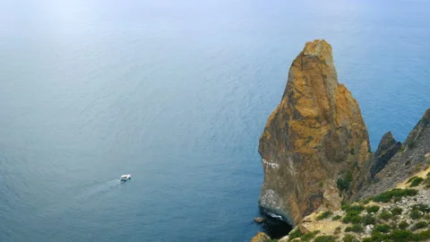 A small ship sails on the sea. Video stock 98002897