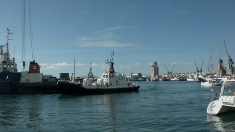 Small ship is on unloading in the port of Cape Town Stock Footage 121397885