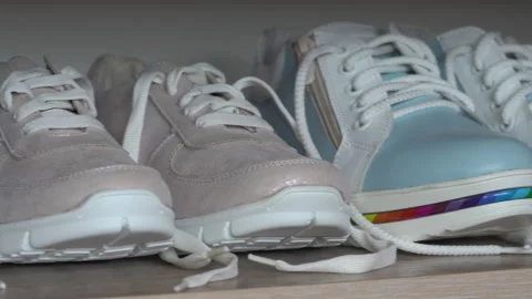 Small shoes on the shelf Stock Footage 344691259
