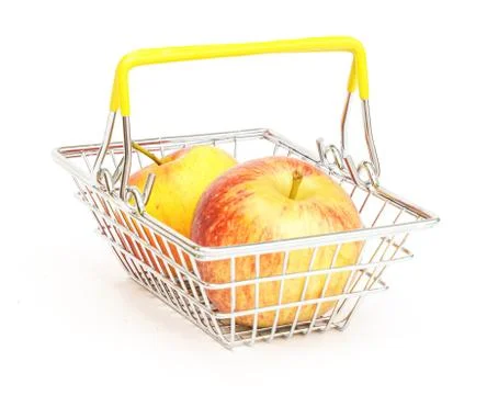A small shopping basket with fruits, apples, on a white background. Stock Photos