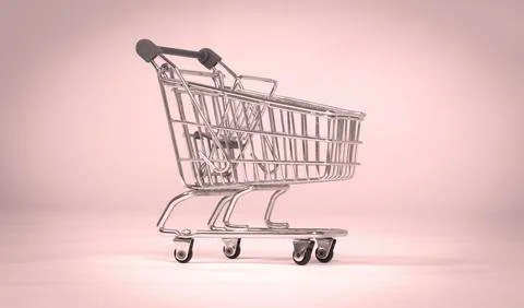 Small shopping cart isolated on solid background Stock Photos
