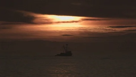 Small shrimp trawler in Pacific ocean off of Laguna Beach, California USA Stock Footage 101265240