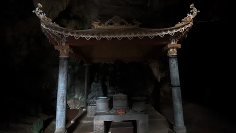 A small shrine inside a cave at Bich Dong Pagoda, Tam Coc, Vietnam Stock Footage 118993548
