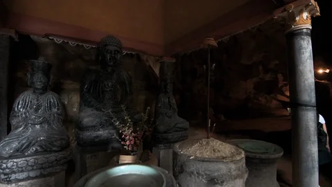 A small shrine inside a cave at Bich Dong Pagoda, Tam Coc, Vietnam Stock Footage 118993595