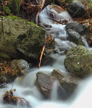Small silky waterfall in the forest Stock Photos