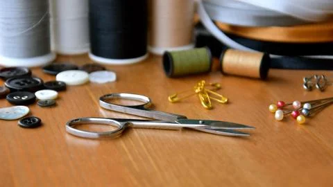 Small silver sewing scissors. Stock Photos