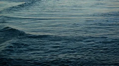 Small silvered waves on the sea Stock-Footage 12623501