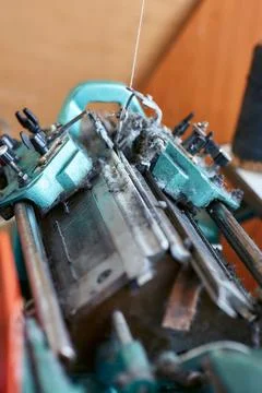 A small simple knitting machine with threads Stock Photos