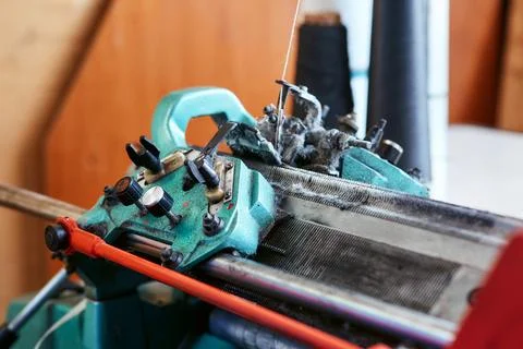 A small simple knitting machine with threads Stock Photos