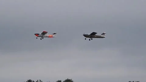 Small single engine airplanes taking off at airport Stock Footage 250081506