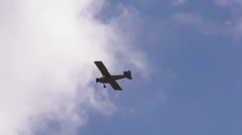 Small single engine plane pulling a cable Stock Footage 1067243