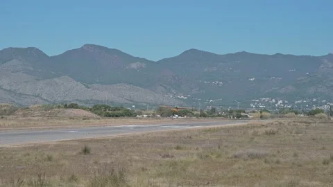 Small single engine training aircraft taking off from Aeroclub of Castello with Stock Footage 232371325