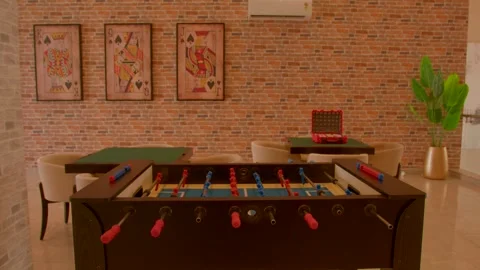 Small size Indoor table soccer game in club house Stock Footage 295919671