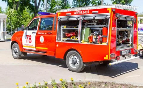 Small-sized fire truck based on UAZ vehicle. Fire extinguishing vehicle Stock Photos
