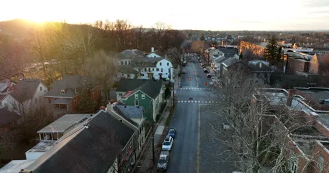 Small ski town in winter scene area. Dramatic sunlight sunset. Quaint Stock Footage 168726521