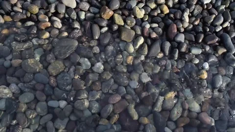 Small smooth pebbles at the beach Stock Footage 113346205