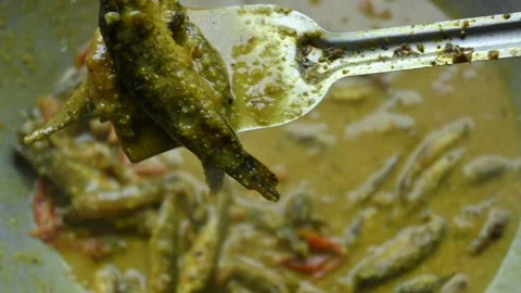 Small Snakehead or Channa orientalis fish curry. Stock Footage 321379096