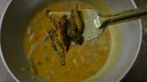 Small Snakehead or Channa orientalis fish curry. Stock Footage 321379183
