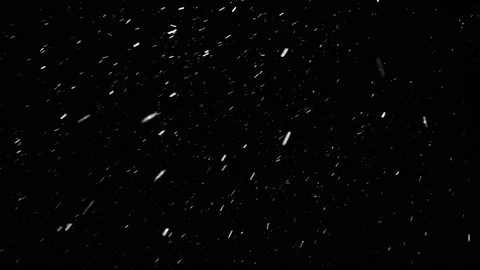 Small snowflakes falling softly from the sky from left to right, loop. Stock Footage 148053213