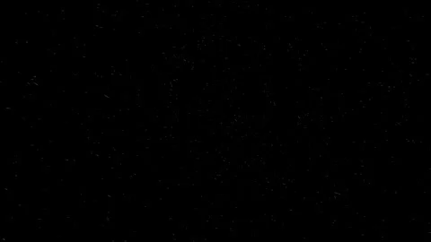 Small snowflakes flying against a dark background Stock Footage 319512606