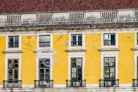 Small soap bubbles drifting across Lisbon square on winter day Stock Photos