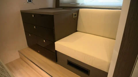 Small sofa and chest of drawers on a boat Stock Footage 62574179