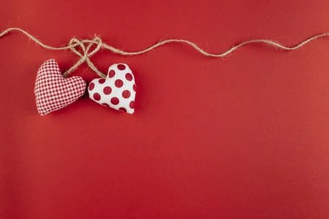 Small soft hearts with rope table Foto stock