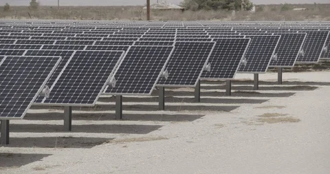 Small Solar farm in Desert Pan Right to Left Stock Footage 89941512