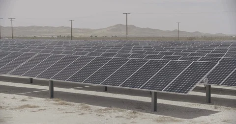 Small Solar farm in Desert Wide Shot with Zoom Out Stock Footage 89941572
