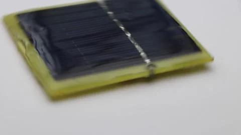 Small solar panel or mini solar cell used in powering small electronics Video stock 149858935