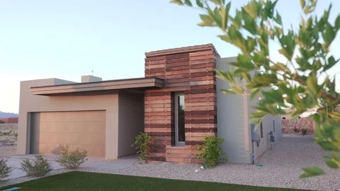 Small Southwest Modern Home Exterior Lower Reveal from Tree Stock Footage