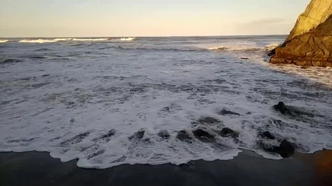 The small Sparrow island and the sound of the waves of the Pacific Ocean, Japan Stock Footage 123777898